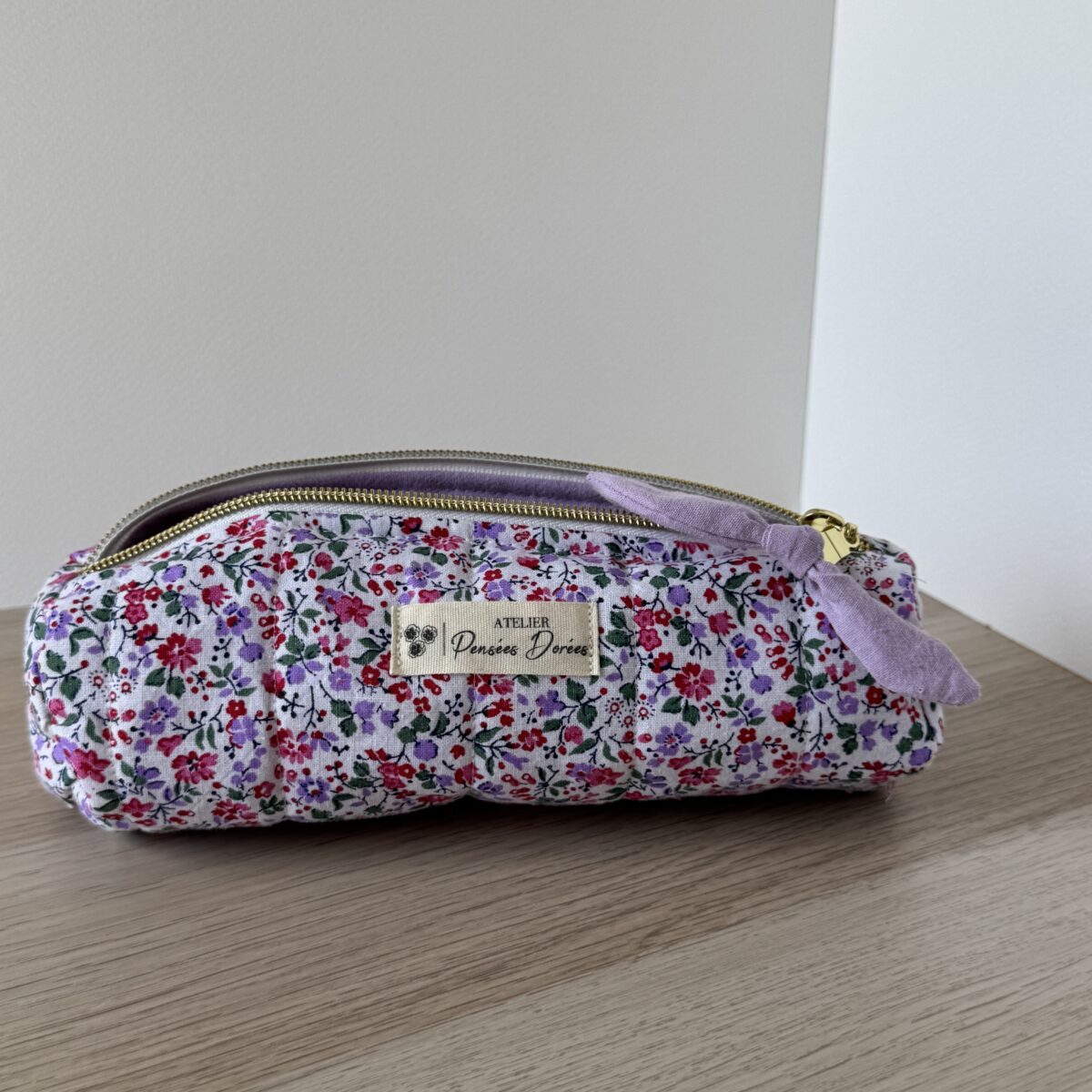 Trousse à stylos fleuri matelassé rose